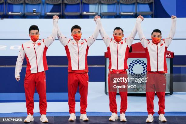 Bronze medalists Sun Wei, Xiao Ruoteng, Zou Jingyuan and Lin Chaopan of Team China pose after the Artistic Gymnastics Men's Team Final on day three...