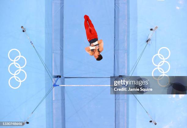 Brody Malone of Team United States competes on the horizontal bar during the Men's Team Final on day three of the Tokyo 2020 Olympic Games at Ariake...