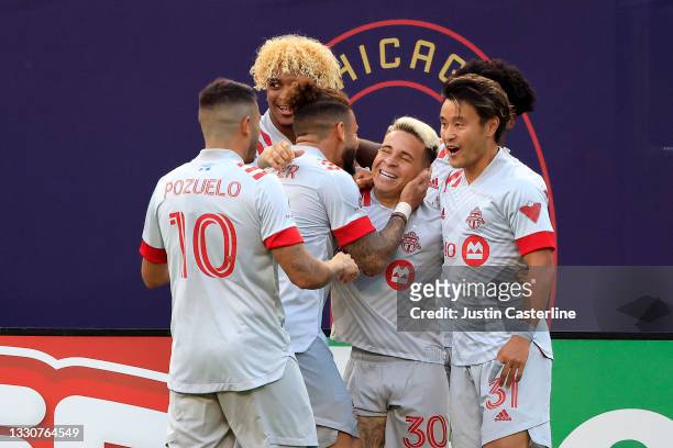 Yeferson Soteldo of Toronto FC celebrates with his team after scoring a goal in the game against the Chicago Fire at Soldier Field on July 24, 2021...
