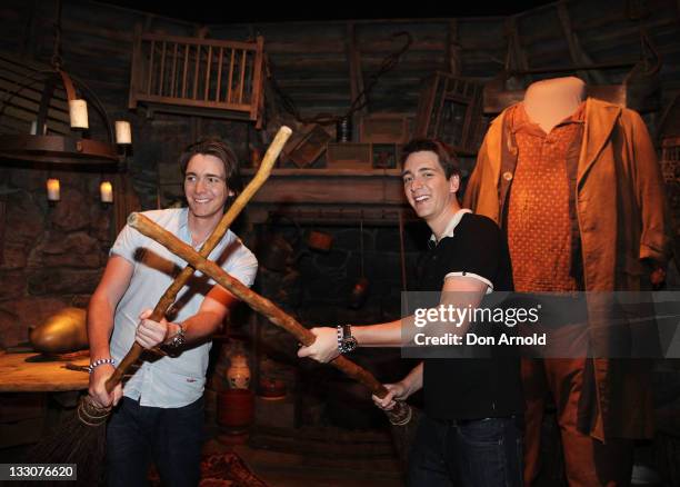 Oliver and James Phelps pose at the Powerhouse Museum on November 17, 2011 in Sydney, Australia.