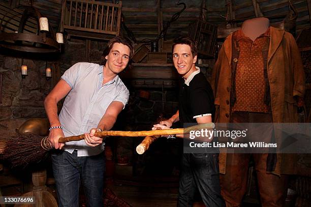 James and Oliver Phelps from the Harry Potter movies pose during a media preview of the "Harry Potter: The Exhibition at the Powerhouse Museum on...