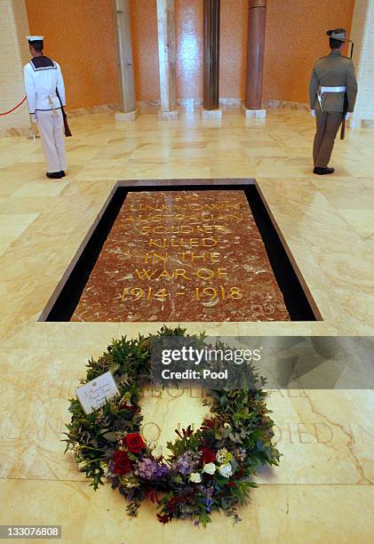 Wreath placed by U.S. President Barack Obama is seen at the tomb of an unknown soldier at the Australian War Memorial on the second day of his 2-day...