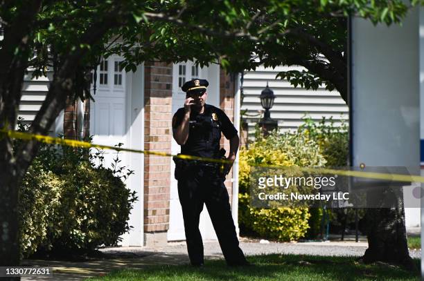 Suffolk County, New York, police investigate a triple homicide at Overlook Dr. In Farmingville, New York on July 23, 2021.