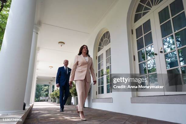 Vice President Kamala Harris and U.S. President Joe Biden arrive walk to a ceremony in the Rose Garden of the White House on July 26, 2021 in...