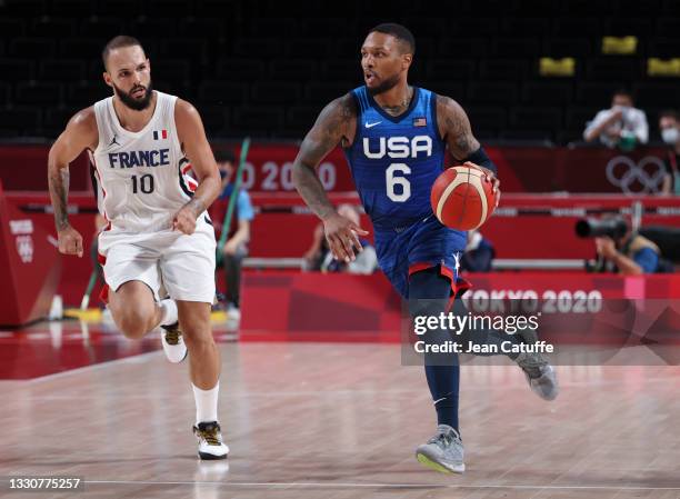 Damian Lillard of USA, Evan Fournier of France during the Men's Preliminary Round Group B basketball game between United States and France on day two...