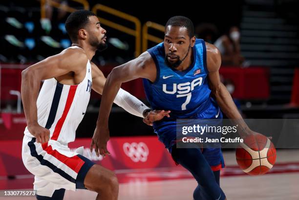 Kevin Durant of USA, Timothe Luwawu-Cabarrot of France during the Men's Preliminary Round Group B basketball game between United States and France on...