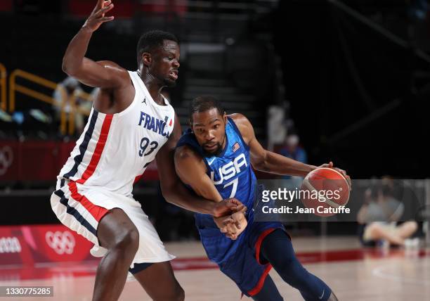 Kevin Durant of USA, Moustapha Fall of France during the Men's Preliminary Round Group B basketball game between United States and France on day two...