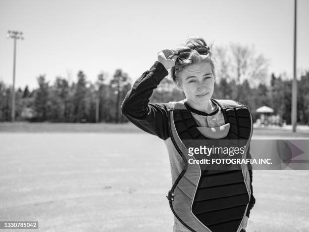transgender woman playing baseball outdoor - transgender athlete stock pictures, royalty-free photos & images