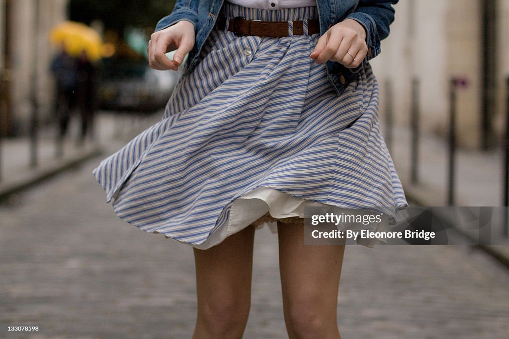 Blue skirt in wind