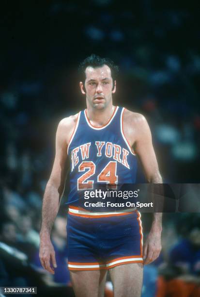 Bill Bradley of the New York Knicks looks on against the Washington Bullets during an NBA basketball game circa 1975 at the Capital Centre in...