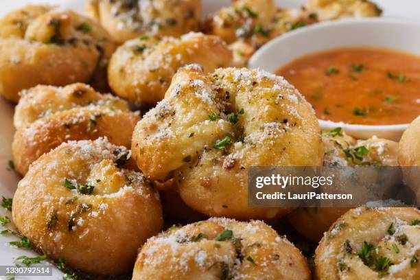 soft and chewy parmesan garlic knots - tied knot stock pictures, royalty-free photos & images