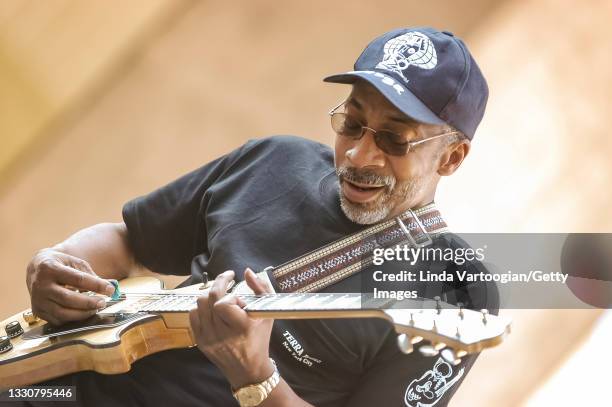 American Blues musician Andy Story plays guitar as he performs during Larry Johnson's Blues House Jam, part of the 19th Annual Roots of American...