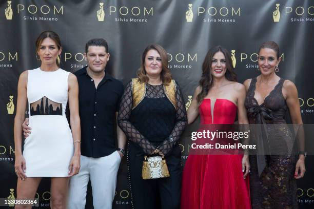 Nieves Alvarez, Manu Tenorio, Silvia Moreno, Alicia Senovilla and Elsa Anka attend at the POOM Silvia Moreno store opening on July 26, 2021 in...