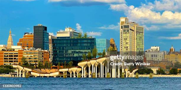 view from hudson river of little island and chelsea buildings, nyc - barry island panoramic stock-fotos und bilder