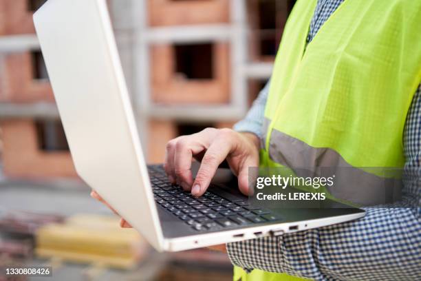Best Laptop For Construction Workers Laptop Construction Closeup Photos and Premium High Res Pictures