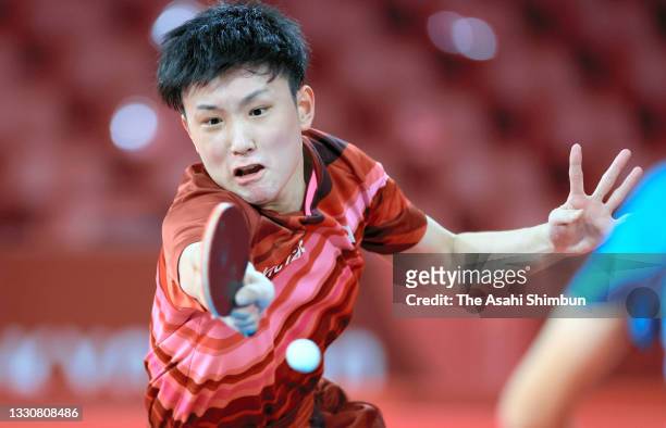 Tomokazu Harimoto of Team Japan competes in the Men's Singles Round 3 match against Lam Siu Hang of Team Hong Kong on day three of the Tokyo 2020...