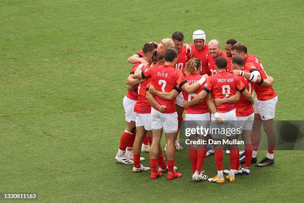 The Team Great Britain huddle during the Men's Pool B Rugby Sevens match between Fiji and Great Britain on day four of the Tokyo 2020 Olympic Games...