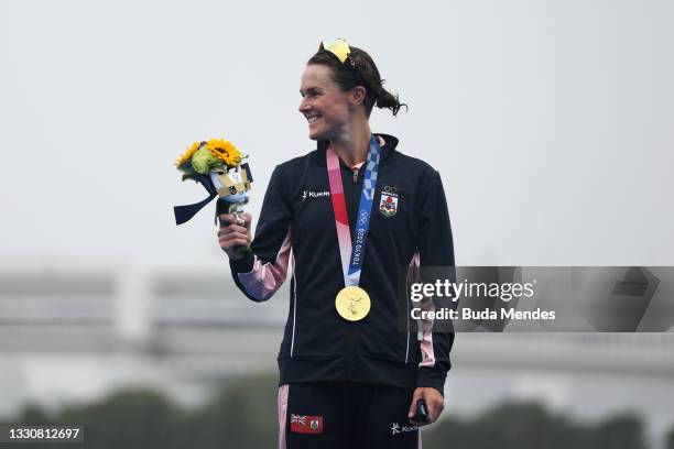 Gold medalist Flora Duffy of Team Bermuda reacts after receiving her medal during the Women's Individual Triathlon on day four of the Tokyo 2020...