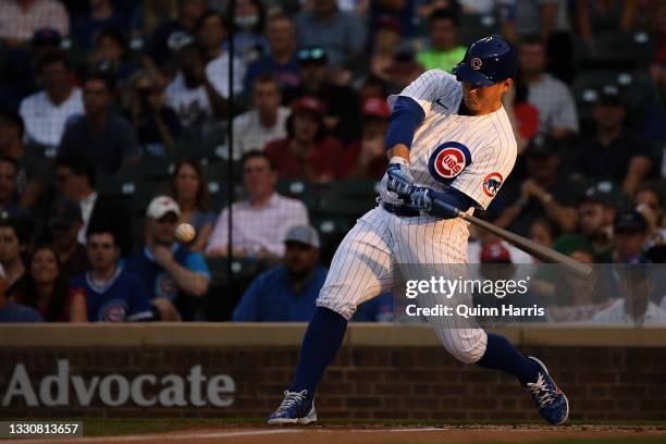 Anthony Rizzo of the Chicago Cubs hits a two run home run in the first inning against the Cincinnati Reds at Wrigley Field on July 26, 2021 in...