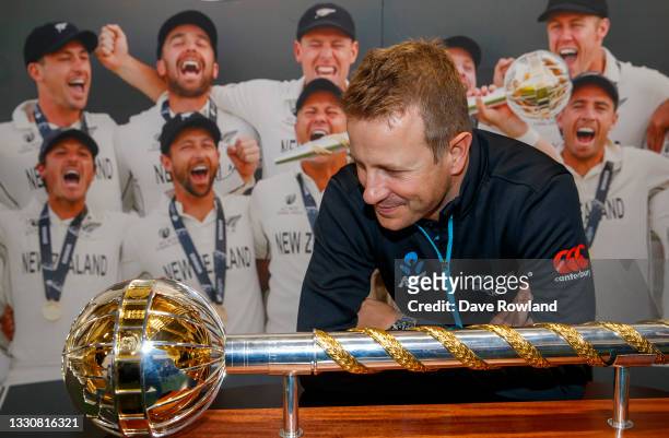 New Zealand cricketer Neil Wagner looks at the World Test Cricket Mace at Eden Park on July 27, 2021 in Auckland, New Zealand.
