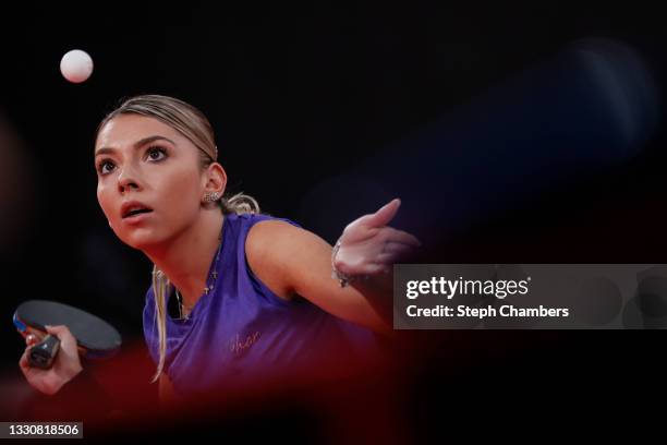 Bernadette Szocs of Team Romania serves the ball during her Women's Singles Round 3 match on day four of the Tokyo 2020 Olympic Games at Tokyo...