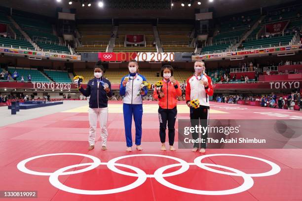 Silver medalist Sarah Leonie Cysique of Team France, gold medalist Nora Gjakova of Team Kosovo, bronze medalists Tsukasa Yoshida of Team Japan and...