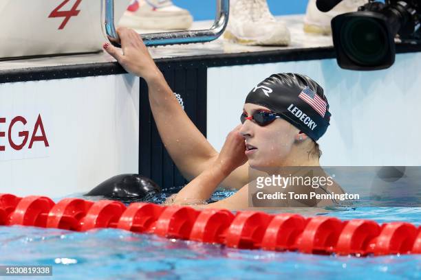 Katie Ledecky of Team United States reacts after competing in the Women's 200m Freestyle Semifinal on day four of the Tokyo 2020 Olympic Games at...