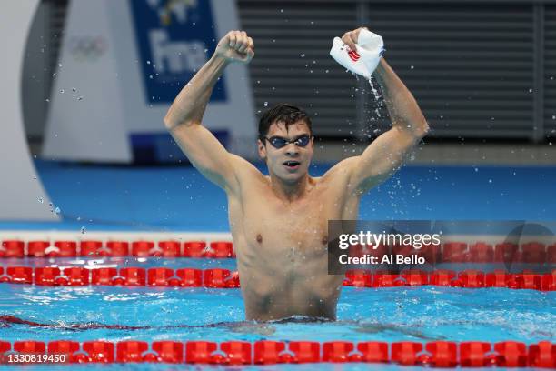 Evgeny Rylov of Team ROC celebrates after winning the Men's 100m Backstroke Final on day four of the Tokyo 2020 Olympic Games at Tokyo Aquatics...