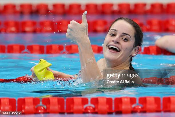 Kaylee McKeown of Team Australia celebrates after winning the gold medal in the Women's 100m Backstroke Final on day four of the Tokyo 2020 Olympic...