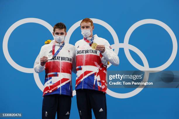 Duncan Scott and Tom Dean of Team Great Britain pose with their medals after the Men’s 200m Freestyle Final on day four of the Tokyo 2020 Olympic...