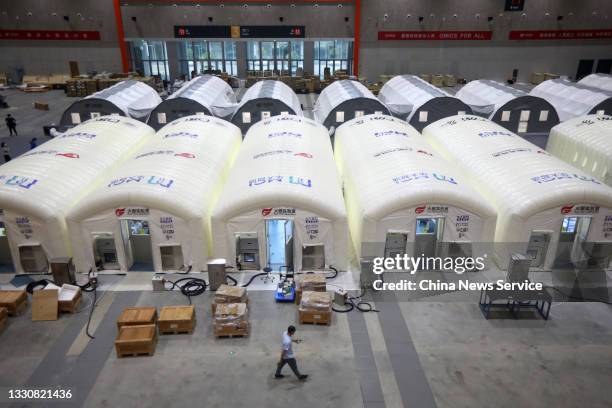 Inflatable Huo-Yan Laboratories are seen set up for COVID-19 nucleic acid tests at Nanjing International Exhibition Center on July 26, 2021 in...