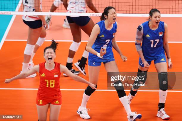 Team China celebrates against Team United States after a point during the Women's Preliminary - Pool B volleyball on day four of the Tokyo 2020...