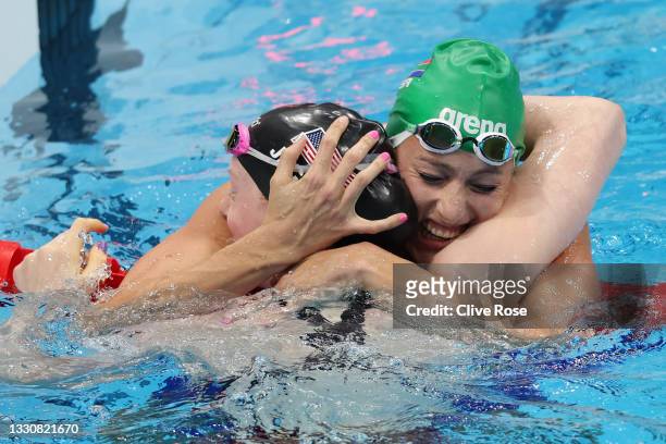 Lydia Jacoby of Team United States and Tatjana Schoenmaker of Team South Africa celebrates after winning the gold and silver medals respectively in...