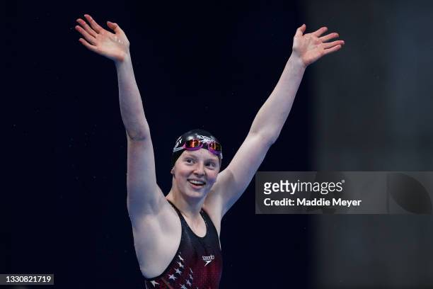 Lydia Jacoby of Team United States celebrates after winning the gold medal in the Women's 100m Breaststroke Final on day four of the Tokyo 2020...