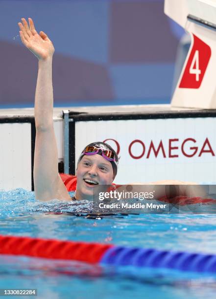 Lydia Jacoby of Team United States celebrates after winning the gold medal in the Women's 100m Breaststroke Final on day four of the Tokyo 2020...