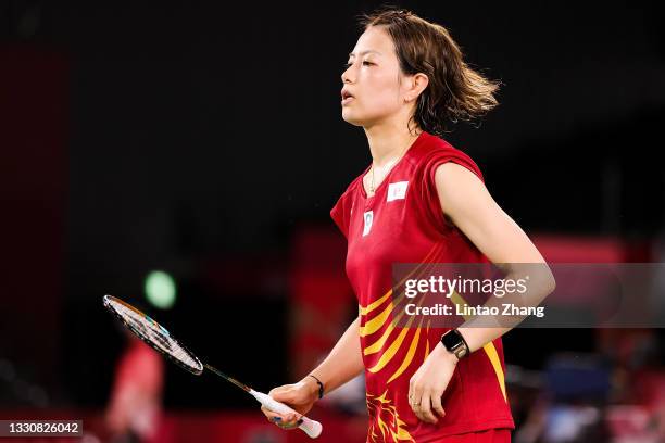 Yuki Fukushima and Sayaka Hirota of Team Japan react as they compete against Greysia Polii and Apriyani Rahayu of Team Indonesia during a Women's...