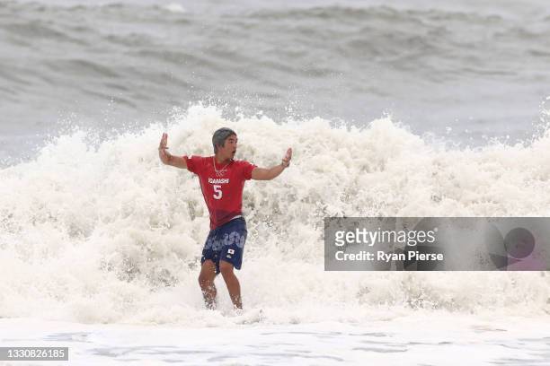 Kanoa Igarashi of Team Japan shows emotion after riding a wave during his mens's semi final on day four of the Tokyo 2020 Olympic Games at...