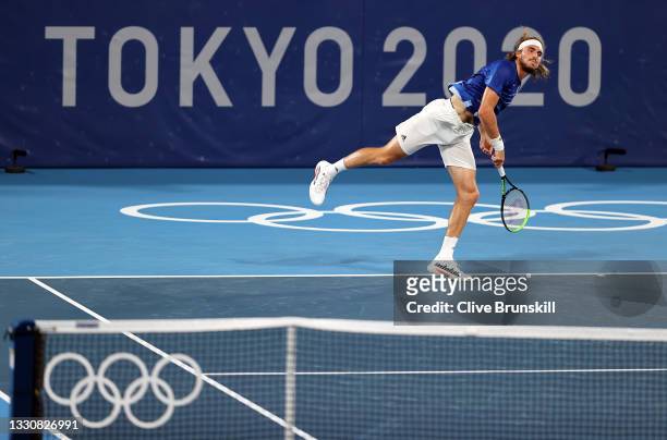 Stefanos Tsitsipas of Team Greece serves during his Men's Singles Second Round match against Frances Tiafoe of Team USA on day four of the Tokyo 2020...