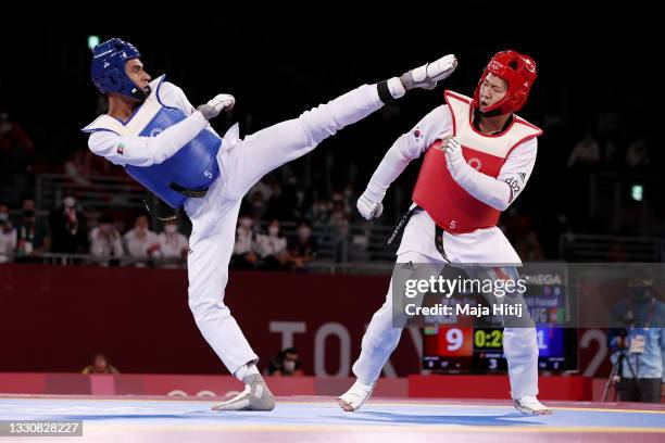 Farzad Mansoori of Team Afghanistan competes against In Kyo-don of Team South Korea during the Men's +80kg Taekwondo Round of 16 contest on day four...