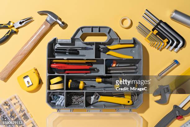 opened diy toolbox with a collection of tools - hand tool foto e immagini stock