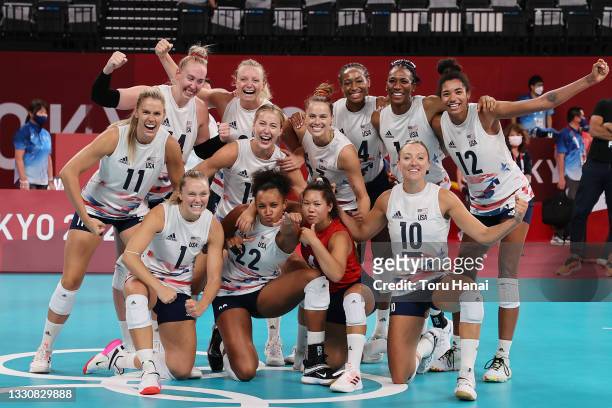 Team United States celebrates after defeating Team China during the Women's Preliminary - Pool B volleyball on day four of the Tokyo 2020 Olympic...