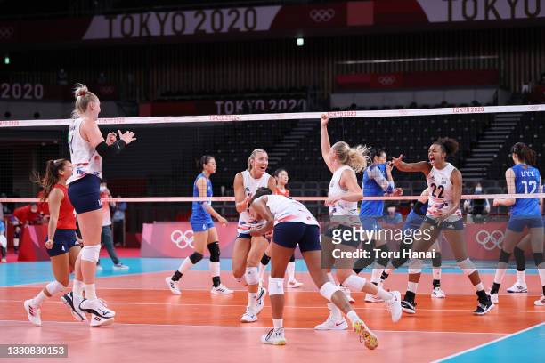 Team United States celebrates after defeating Team China during the Women's Preliminary - Pool B volleyball on day four of the Tokyo 2020 Olympic...