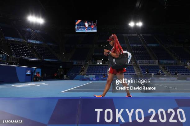 Naomi Osaka of Team Japan leaves the court after defeat in her Women's Singles Third Round match against Marketa Vondrousova of Team Czech Republic...