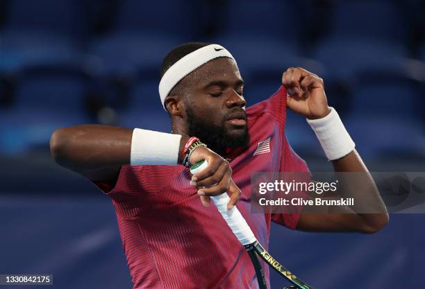 Frances Tiafoe of Team USA reacts after a point during his Men's Singles Second Round match against Stefanos Tsitsipas of Team Greece on day four of...