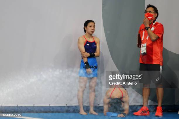 Minami Itahashi and Matsuri Arai of Team Japan react after their final dive during the Women's Synchronised 10m Platform Final on day four of the...