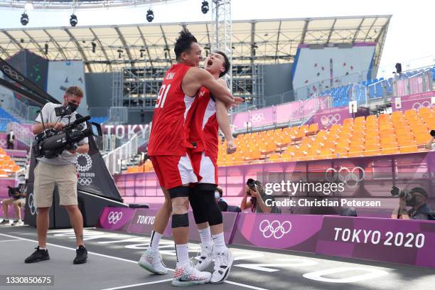 Tomoya Ochiai of Team Japan and Keisei Tominaga of Team Japan celebrate victory in the 3x3 Basketball competition on day four of the Tokyo 2020...