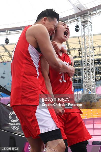 Keisei Tominaga of Team Japan and Tomoya Ochiai of Team Japan celebrate victory in the 3x3 Basketball competition on day four of the Tokyo 2020...