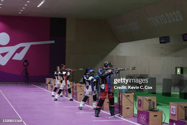 Qian Yang and Haoran Yang of Team China, and Mary Carolynn Tucker and Lucas Kozeniesky of Team United States during the 10m Air Rifle Mixed Team Gold...