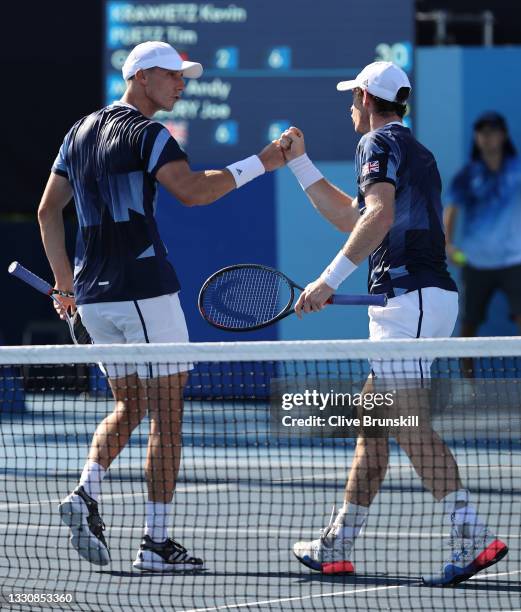 Andy Murray of Team Great Britain and Joe Salisbury of Team Great Britain celebrate after a point during their Men's Doubles Second Round match...