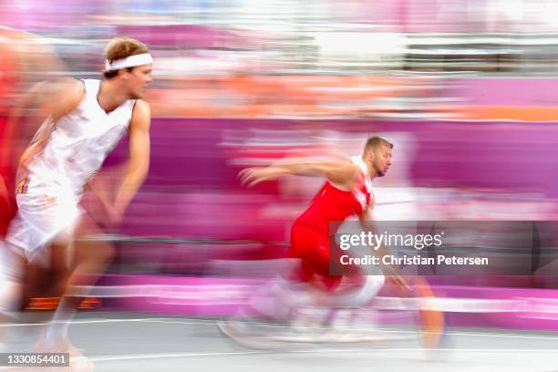 Przemyslaw Zamojski of Team Poland handles the ball in the 3x3 Basketball competition on day four of the Tokyo 2020 Olympic Games at Aomi Urban...